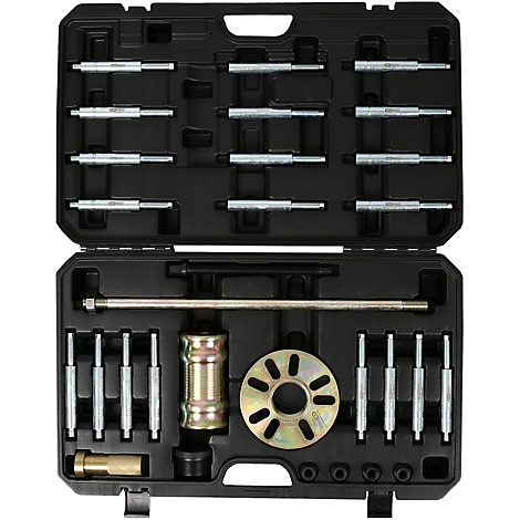 Offener schwarzer Werkzeugkoffer mit verschiedenen Metallwerkzeugen, wie Stiften und Adaptern.